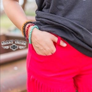 CRAZY TRAIN MOM LENGTH APPROVED RED FRINGE SHORTS
